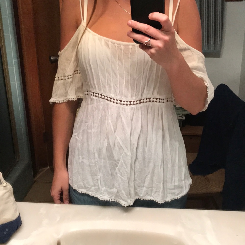 Patrons of peace white blouse